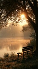 Naklejka premium Tranquil morning bench beside a misty lake bathed in golden sunlight