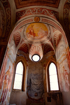 View of the ornate frescoed interior and arched windows of the Pilgrimage Church of the Assumption of Mary on Bled Island in Bled, Radovljica, Slovenia.