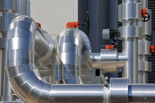 View of insulated data centre cooling pipework and valve assemblies
