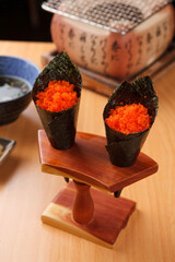 Gunkan maki sushi with roe wrapped in seaweed © Donghyun Kim