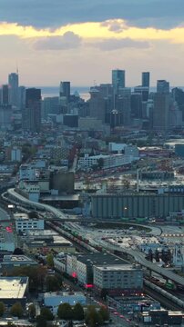 Aerial view of Port of Vancouver, downtown's skyscrapers and nature around