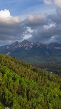 The breathtaking aerial hyperlapse of Tantra mountains and clouds