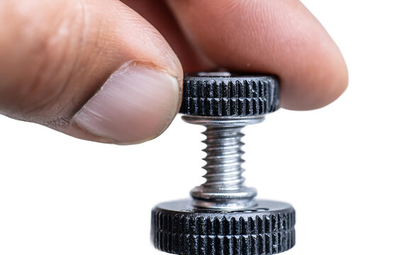 Photographer tightening a tripod mounting plate while preparing camera equipment for a stable photography session