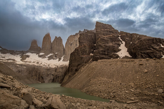 Scenic view of torres del paine national park with snow-capped mountains and blue lake in patagonia