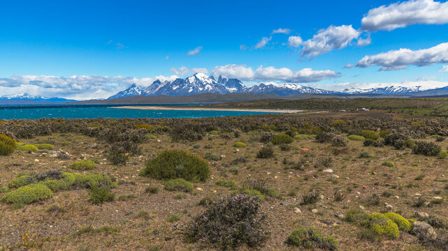 Scenic view of torres del paine national park with snow-capped mountains and blue lake in patagonia