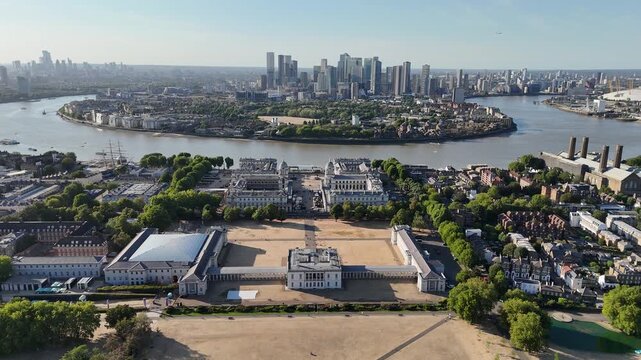 Climate change drought near Canary Wharf London aerial view of Greenwich Park and Old Royal Naval College with brown grass UK heatwave