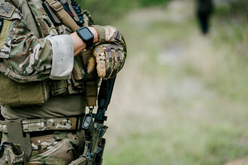 Fototapeta premium Serious outdoor soldiers jungle soldiers on duty showing focused expression and professional stance in tactical uniform for combat mission