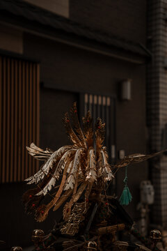 Taito City, Tokyo, Japan - 15 May 2026: View of the golden phoenix ornament atop a traditional mikoshi portable shrine in Asakusa, featuring intricate metallic feathers.