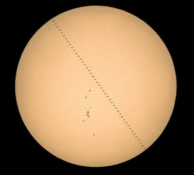International Space Station transit across the sun with sunspots 