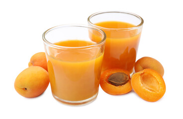 Apricot juice in glasses and fresh fruits isolated on white © New Africa