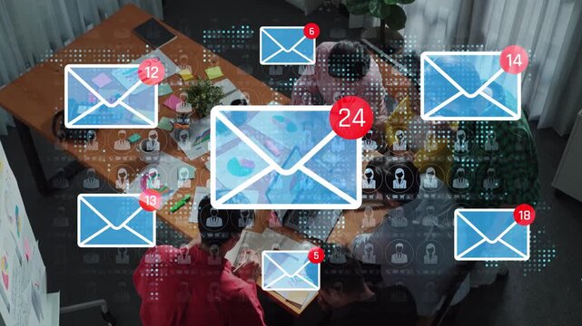 Engaging Team Meeting with Digital Overlays of Email Notifications and Communication Icons Highlighting Interaction and Collaboration in the Workplace Sigmoid