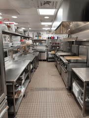 Obraz premium Empty commercial kitchen ready for food preparation