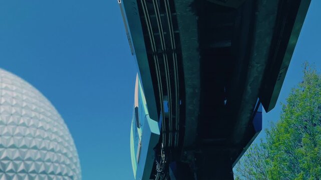 Monorail Passing Near Big Dome
