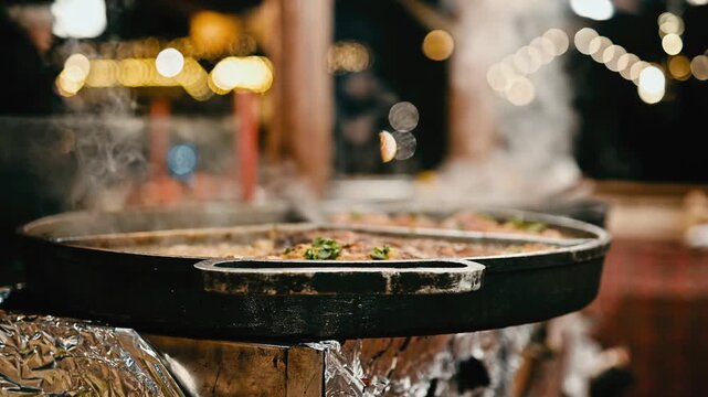 Cooking Street Food In A Big Skillet At The Christmas Market Background