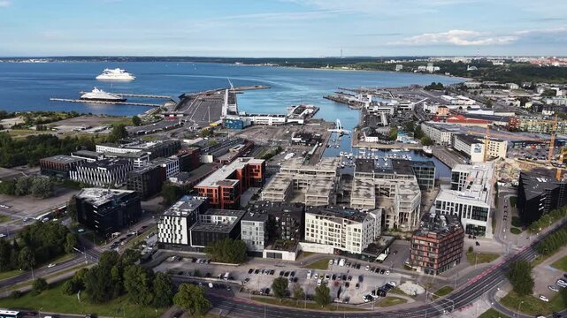 Drone shot of Tallinn port cityscape along the Baltic Sea, Estonia