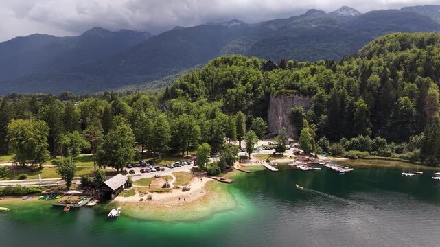 Drone footage of the shoreline and mountains around Lake Bohinj, Slovenia