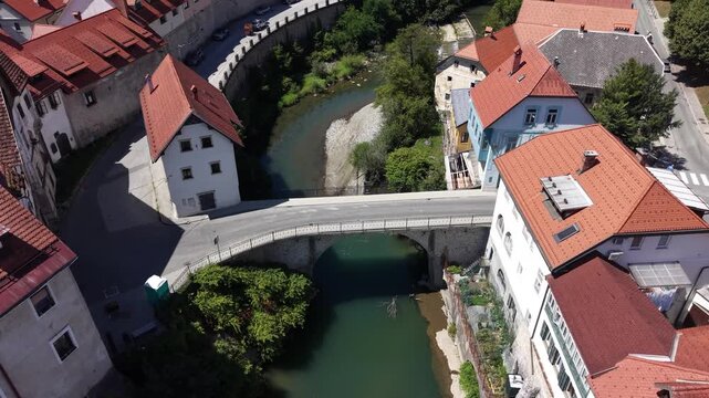 Flight over the Capuchin Bridge (Kapucinski most) in Skofja Loka, Slovenia