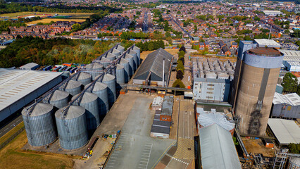 Aerial view of large grain storage silos and plant © Андрей Нелупов