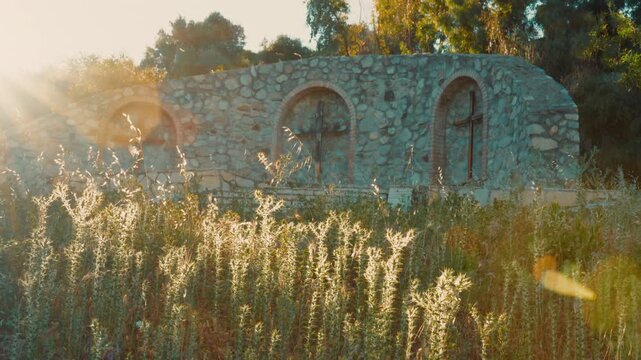 Christian religion crucifixes outdoors in Italy at sunset in divinity connection