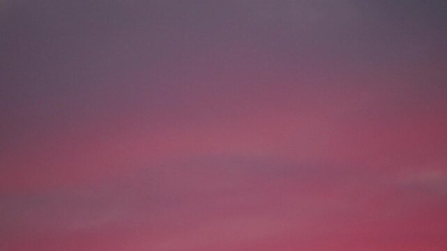 Tokyo,Japan - August 25, 2026: Fading red color of sunset cloud
