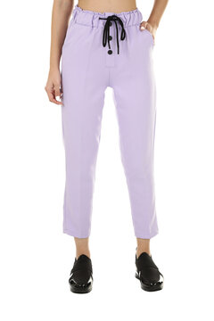Woman wearing pants in a white studio for e-commerce fashion
