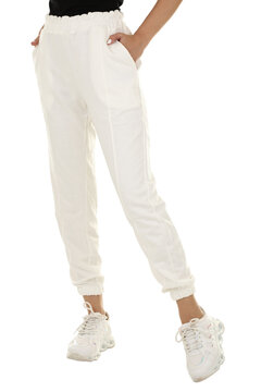 Woman wearing pants in a white studio for e-commerce fashion