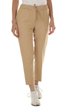 Woman wearing pants in a white studio for e-commerce fashion