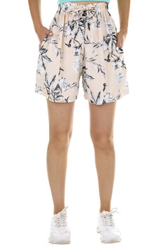 Woman wearing shorts in a white studio for e-commerce fashion