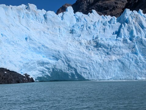 Massive Ice Front of Spegazzini Glacier Across Turquoise Water