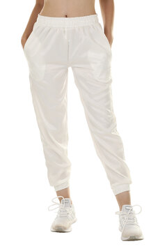 Woman wearing pants in a white studio for e-commerce fashion