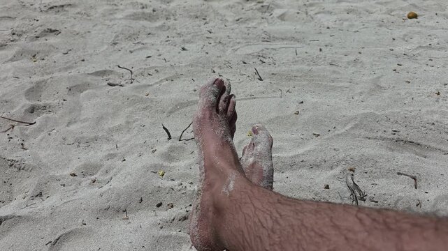 ​POV Close Up of Sandy Feet Relaxing on White Sand Beach, First Person View, 4K Video