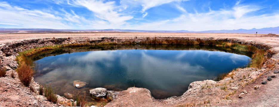 Panoramic view of the Eyes of the desert (Ojos del Salar). Atacama Desert. Chile.