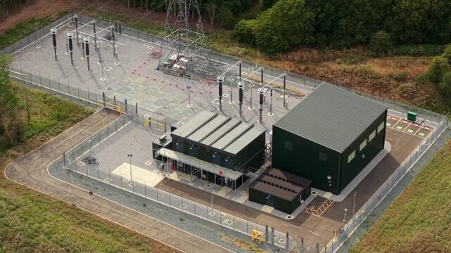 Aerial view of National Grid 400kV Substation Marston Vale with electrical infrastructure, transformers, and switchgear in Bedford, England, United Kingdom.
