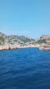Yacht Sailing Past Rocky Island Near Demre