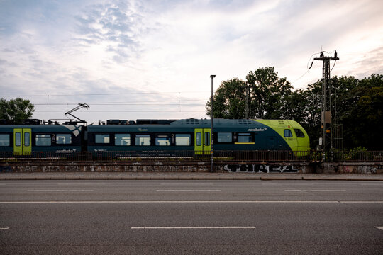 Hamburg, Germany - July 1, 2026: Metronom regional passenger train travelling through central Hamburg, Germany.