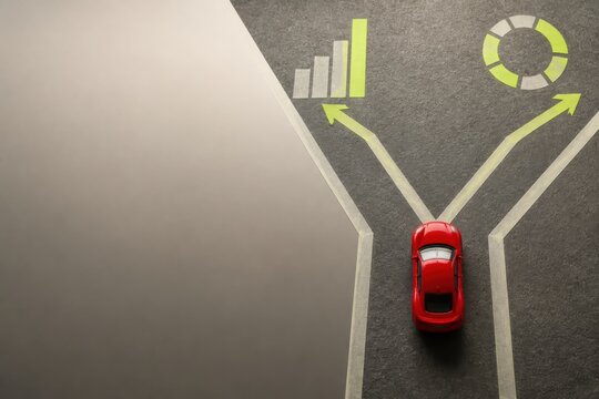 Red Car at Forked Road with Growth Chart and Decision Concept