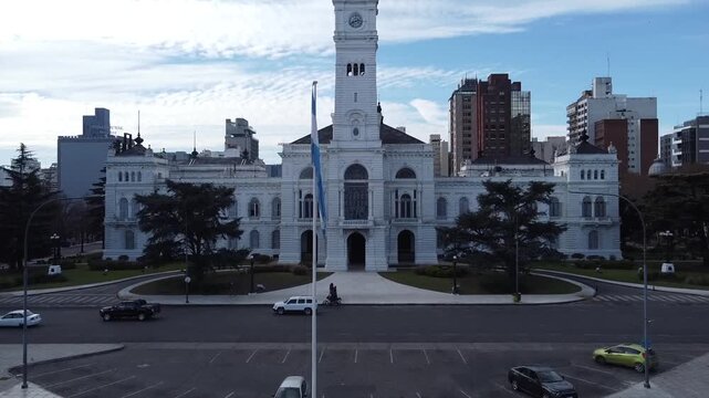 Drone rise over La Plata City Hall and Plaza Moreno with panoramic views toward Ensenada and the river, Argentina.