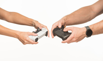 female and male palms with joystick on white background © serhii