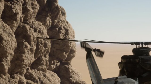 A helicopter is flying close to a large rocky formation. The scene shows a vast desert area with clear skies. Dust is rising as the helicopter moves forward.
