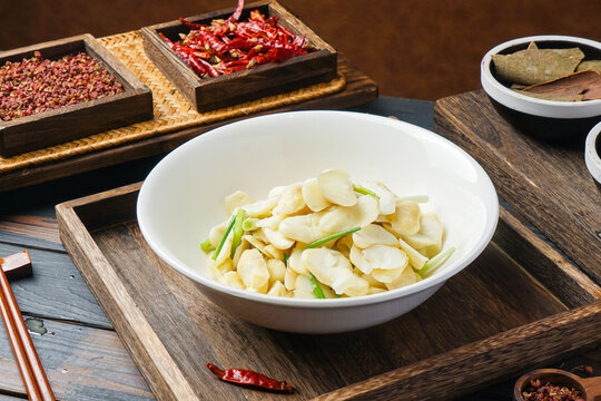 Stir-fried sliced Chinese yam with scallions in a bowl