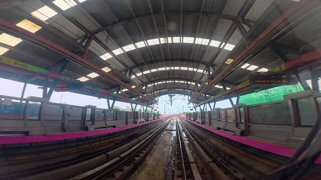 The view from the last coach of a driverless metro train and a video created by reversing the footage.