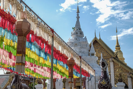 Traditional paper lanterns hanging on the rows in Wat Phra That Hariphunchai, Lamphun province of Thailand during Yi peng (or Yee peng) festival.