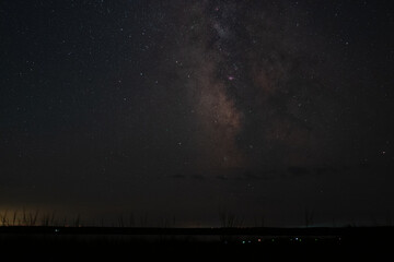 time lapse of stars and clouds in the city © Bai