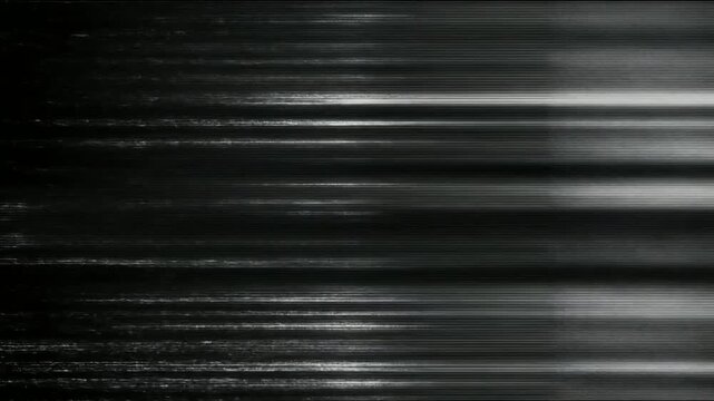 粗い粒子が舞う白黒テレビの砂嵐