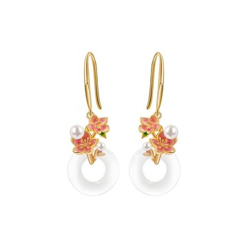 Pair of elegant gold drop earrings decorated with pink enamel flowers, small pearls, and round white jade pendants isolated on white