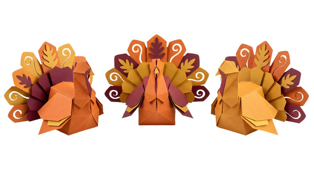Three decorative paper craft turkeys in autumn colors of orange, brown, and yellow, arranged for thanksgiving holiday table decor, isolated on transparent background