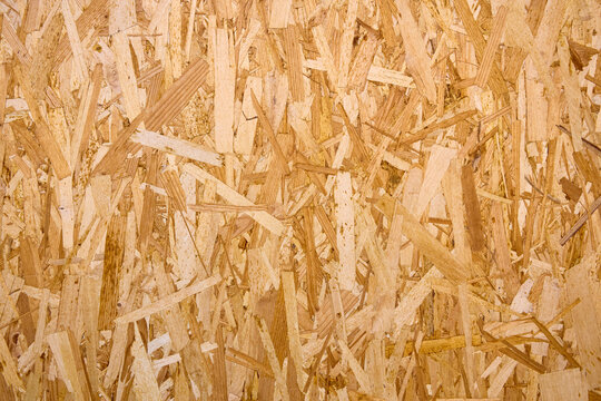 Wood fiberboard surface, detailed view of engineered wood texture