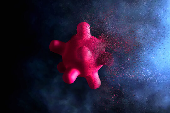Exploded virus cell with particle effect on dark background