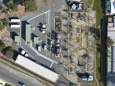 Ferntree Gully, Australia - 24 August 2026: Aerial view of Ferntree Gully Zone Substation showing electrical transformers, switchgear, and power infrastructure in a fenced industrial site.