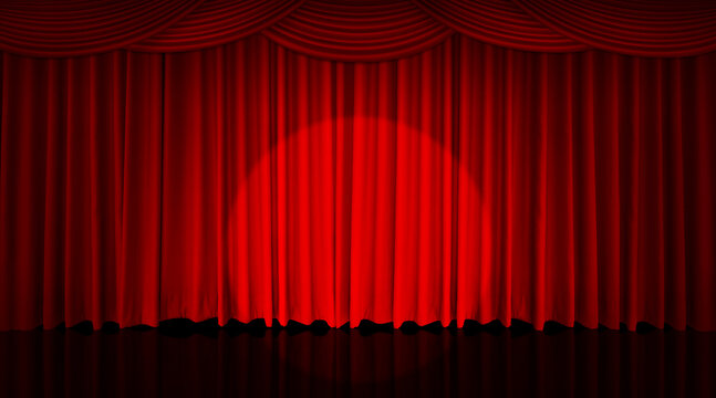 Spotlights illuminate the red curtain on a black stage.